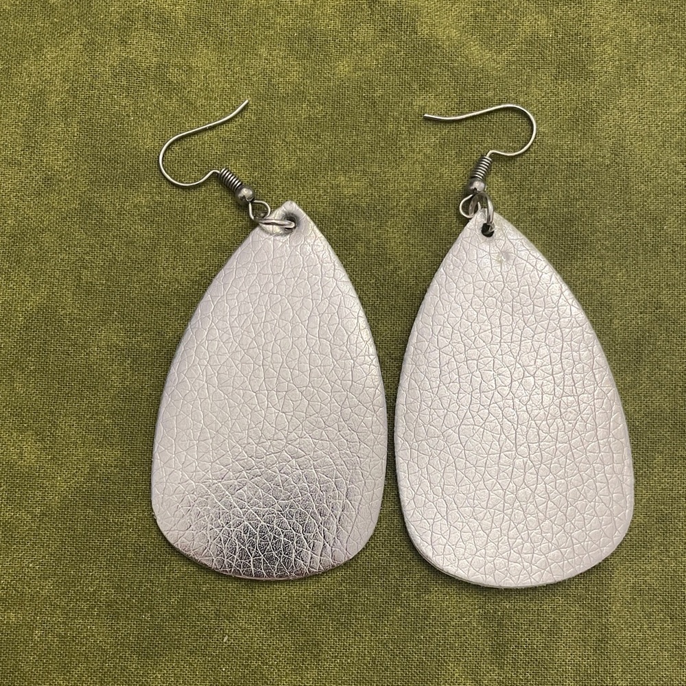 Faux leather tear drop earrings.